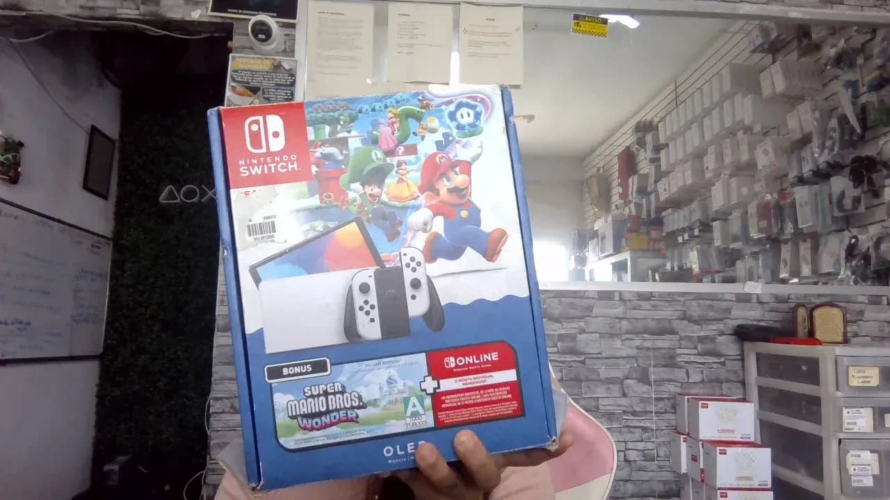 nintendo Switch Oled Blanca en caja con accesorios